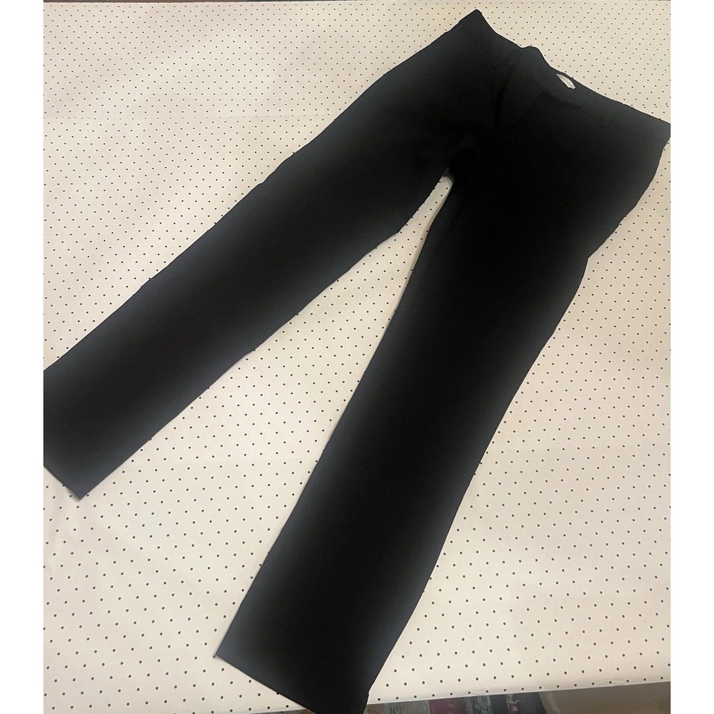 Classic tailored black trousers with sleek minimalist office styling